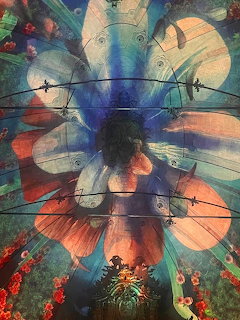 Colorful flower-shaped light projection on the ceiling of Clerigos Church in Porto, Portugal