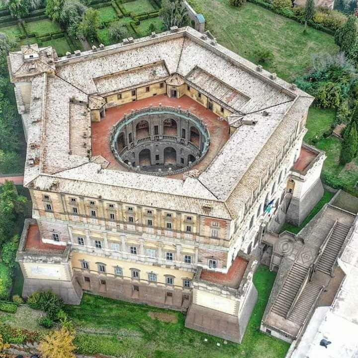 Aerial view of Palazzo Farnese with a pentagonal building and circular courtyard