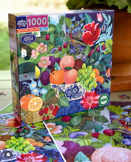 Colorful collage of fruits, flowers, butterflies and vegetables arranged in vibrant layers