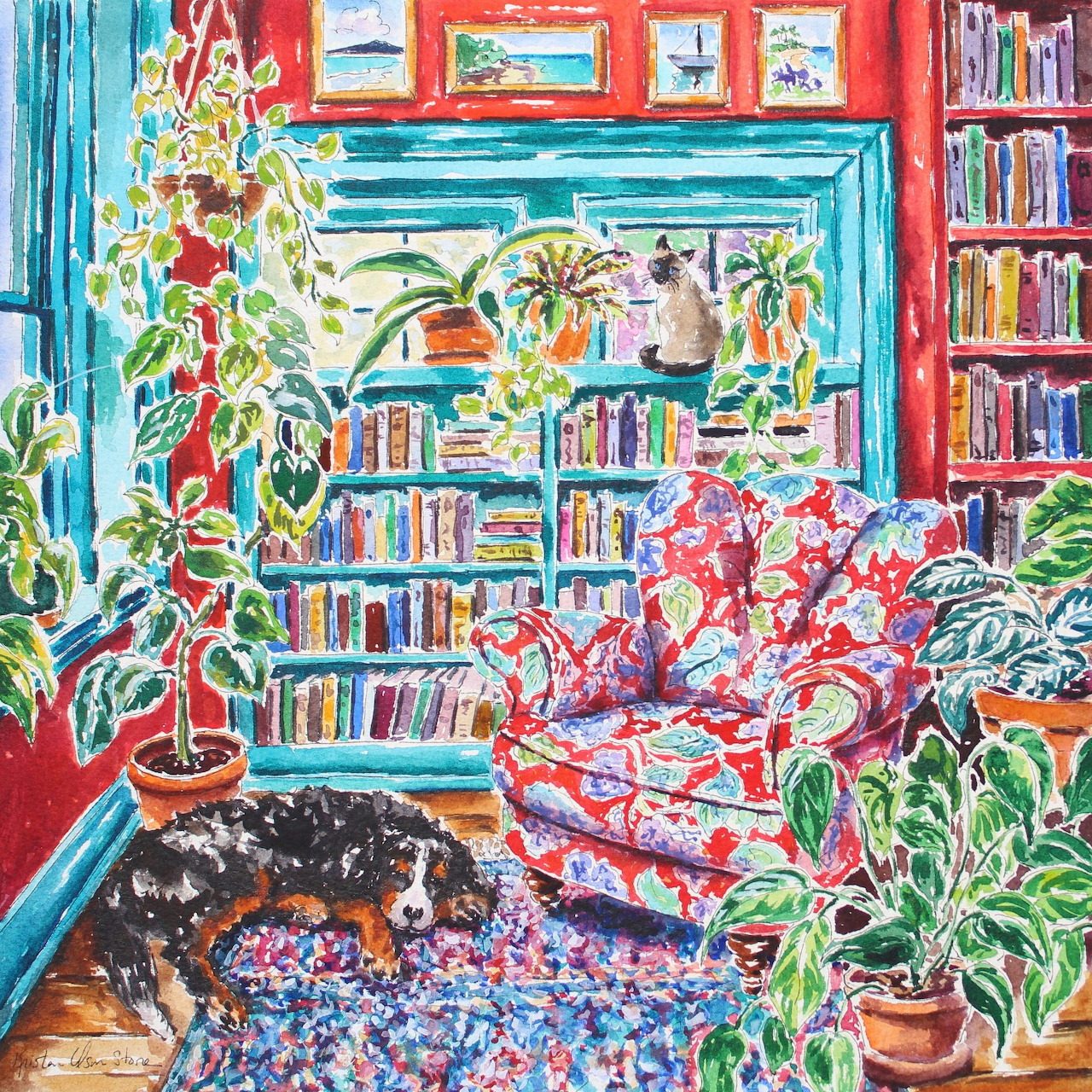 Colorful painted interior with bookshelves, plants, floral chair, and a sleeping dog on a rug