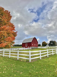 Red Barn in Autumn Field