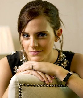 Emma Watson portrait leaning on a chair indoors