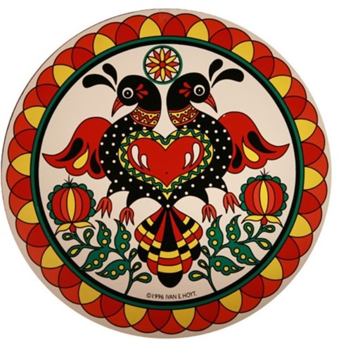 Circular Pennsylvania Dutch hex sign with two black birds, a red heart, flowers, and colorful folk patterns