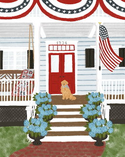 White house front entrance with red door, patriotic decorations, American flag, blue hydrangeas, and golden retriever on porch