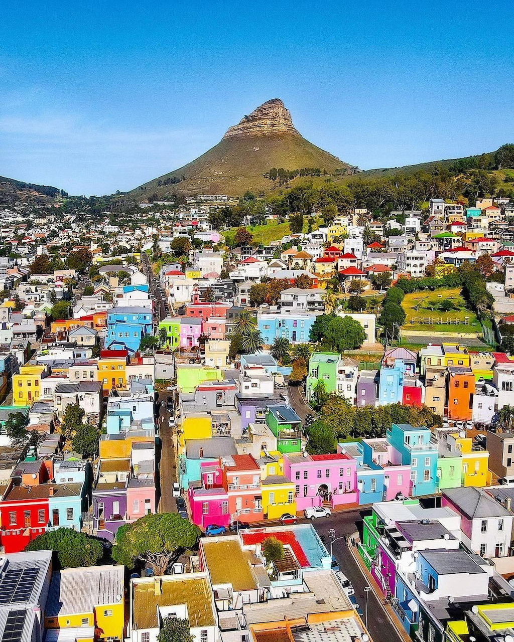 Aerial view of colorful Bo-Kaap houses in Cape Town with Lion's Head mountain behind