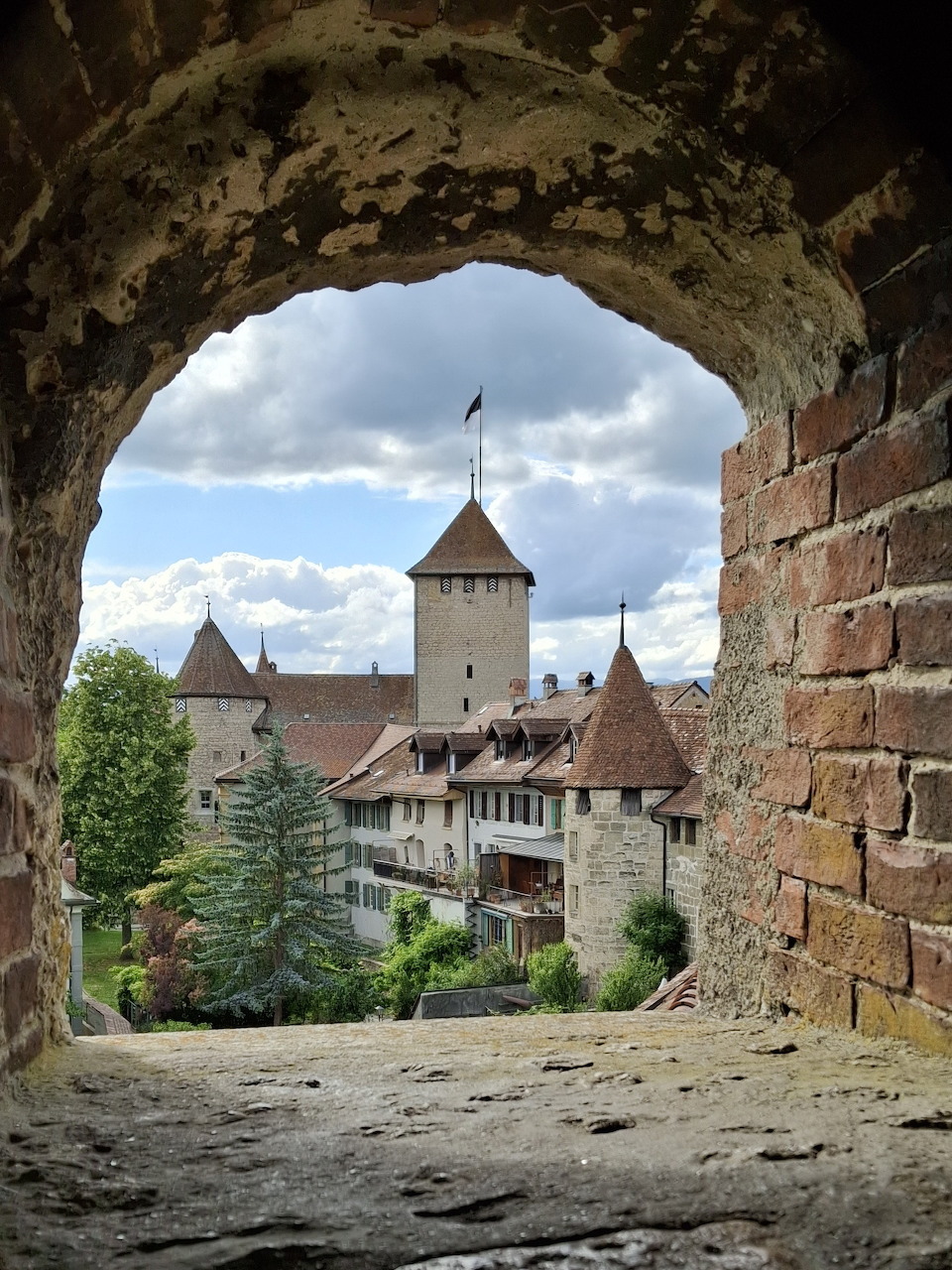 Medieval town of Murten, Switzerland with old buildings and red rooftops