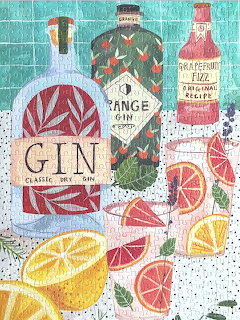Illustration of three decorative gin bottles with citrus fruit slices on turquoise tile background