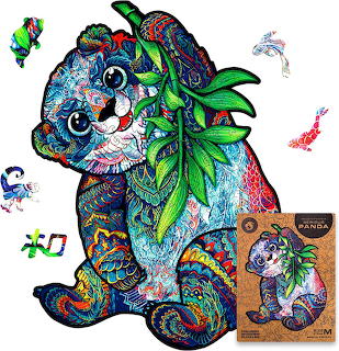 Ornate panda illustration with vibrant blue, green, and purple patterns, flanked by small butterflies and fish