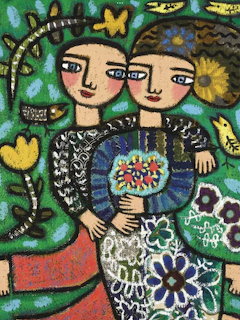 Colorful folk art painting of two women hugging surrounded by flowers, birds, and butterflies