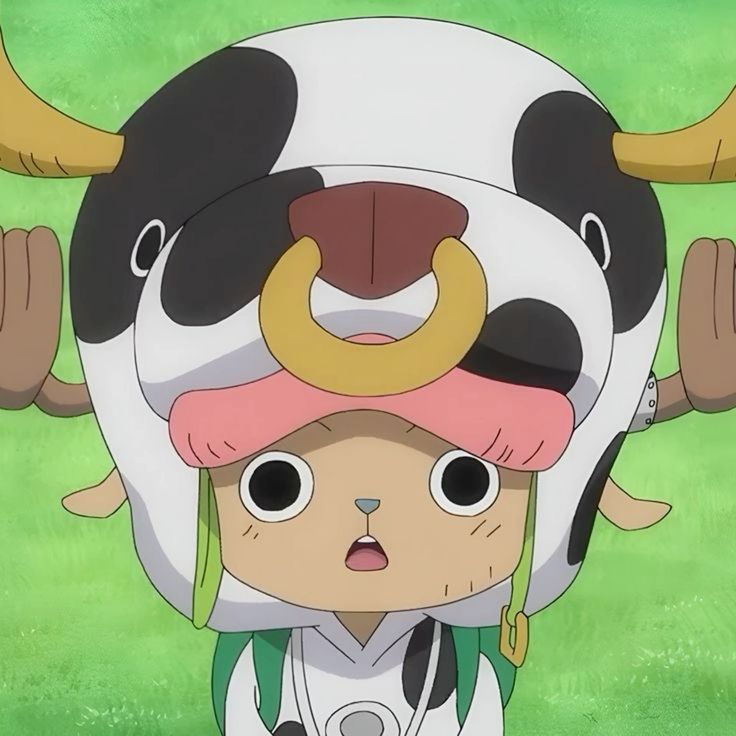 Tony Tony Chopper anime character with pink hat and reindeer antlers standing outdoors