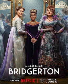 Three women in elaborate Regency-style dresses pose in a blue room on a Bridgerton poster.