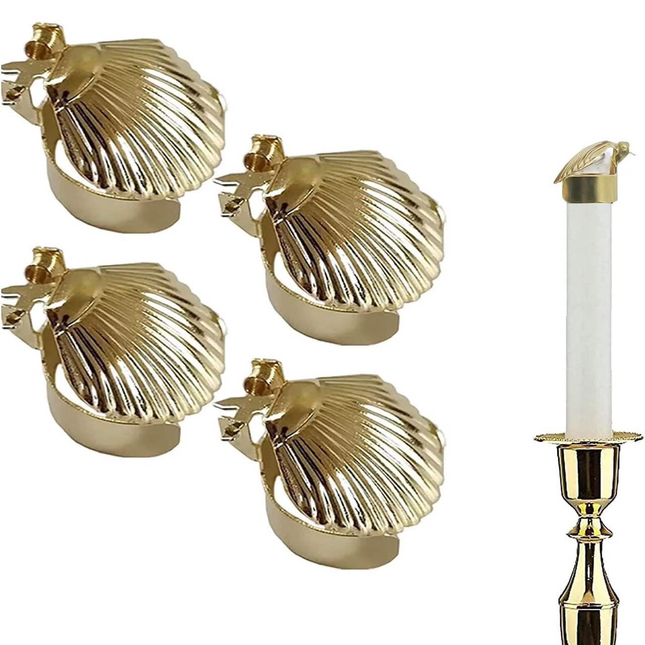 Four brass shell candle clamps and a brass candlestick with white candle arranged on white background
