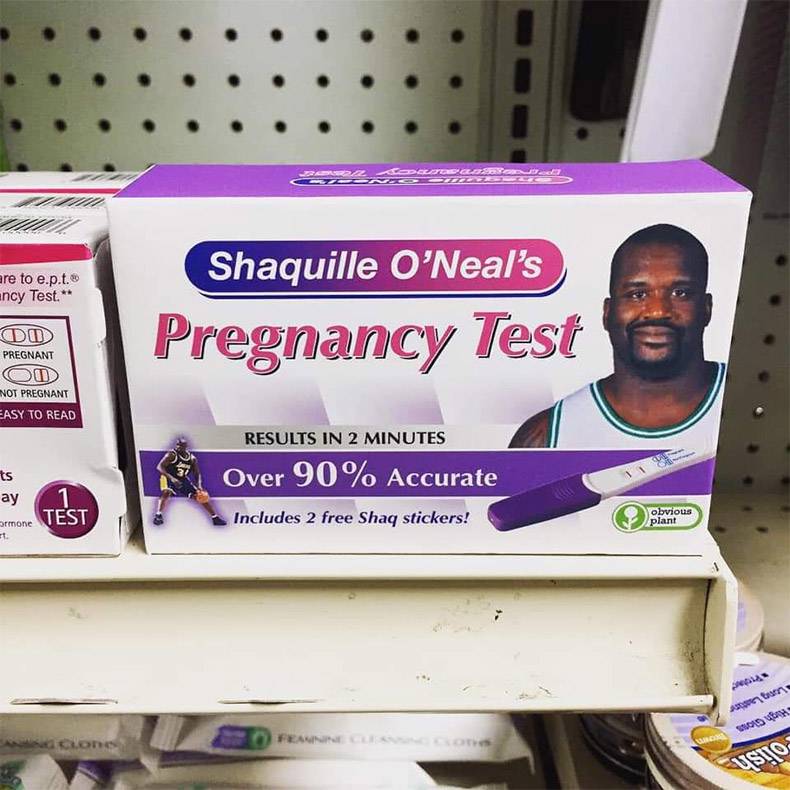 Novelty pregnancy test box with Shaquille O'Neal displayed on a store shelf