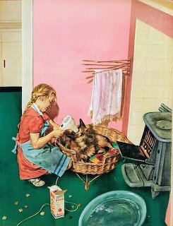 Young girl in red shirt kneeling beside wicker basket bathing a small brown dog on green floor