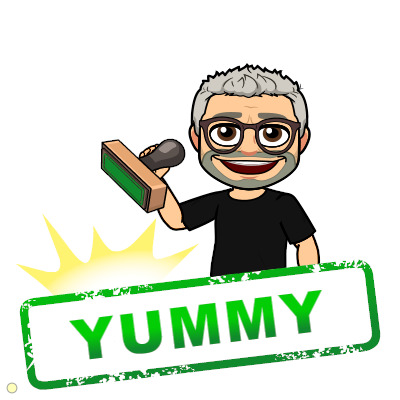 Cartoon emoji man with glasses holding a stamp beside a green YUMMY label