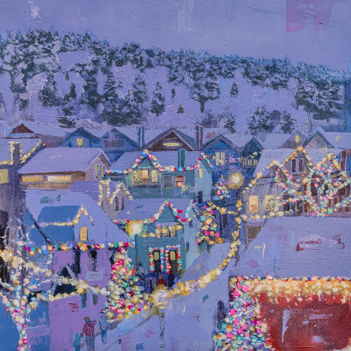 Snowy village with illuminated houses and Christmas decorations at dusk