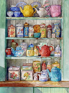 Colorful vintage kitchen items including teapots, tins, and jars arranged on wooden shelves