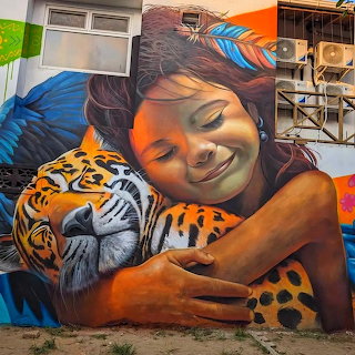 Girl Hugging Tiger Mural