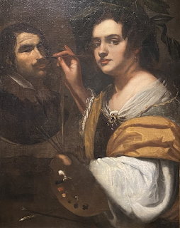 Baroque painting of a woman painter with brush and palette painting a man's portrait