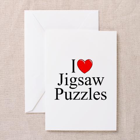 Text design reading 'I heart jigsaw puzzles' with a red heart icon