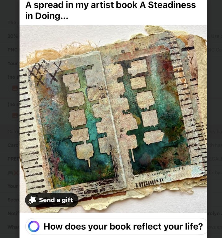 Open artist book with mixed media spread showing rectangular frames and colorful layered textures