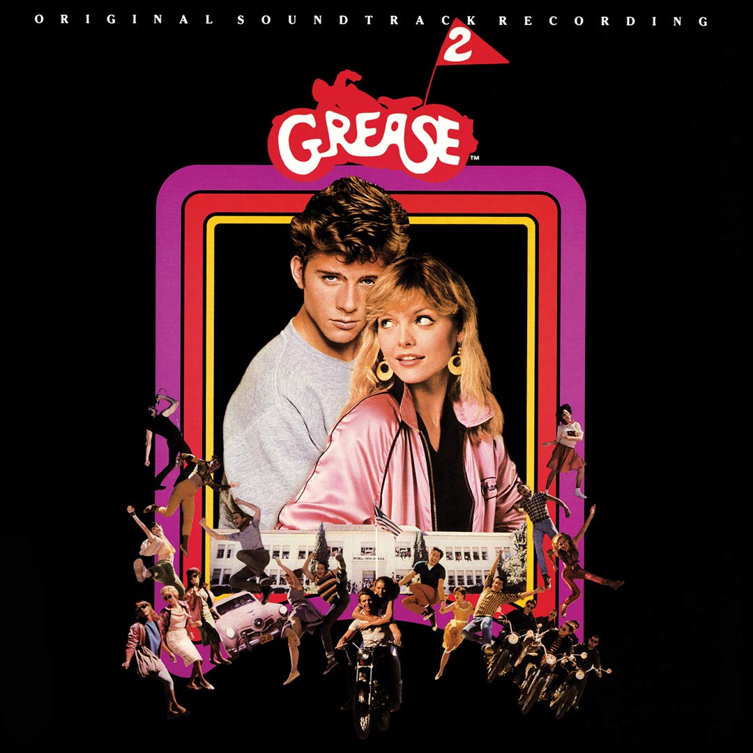 Grease 2 soundtrack cover with a young couple framed by colorful borders on a black background