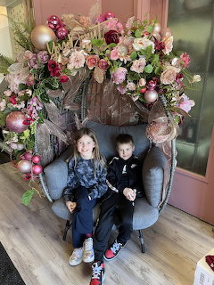 Children on Floral Christmas Chair