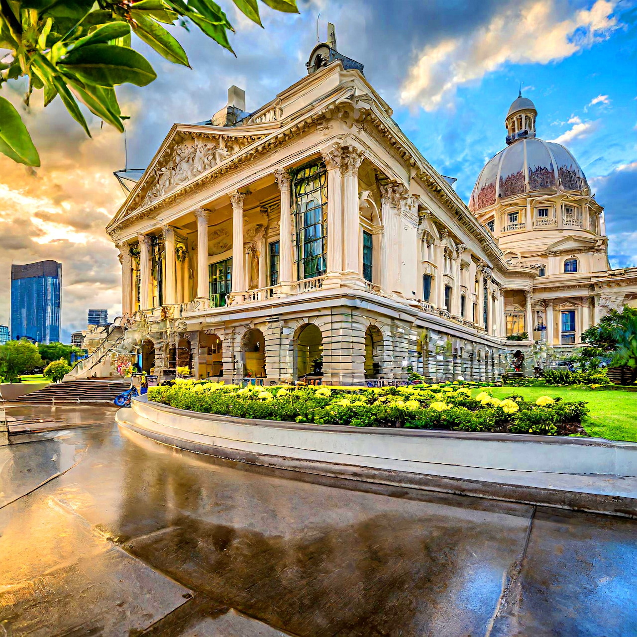 Classical Beaux-Arts building with columns and dome reflected in wet plaza at sunset