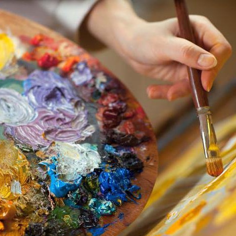 Abstract mix of vivid multicolored paint splashes and swirls