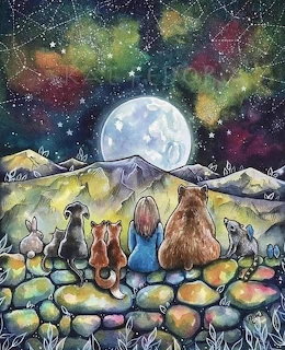 Cats silhouetted on stone wall gazing at large moon rising over mountains with vibrant starry sky