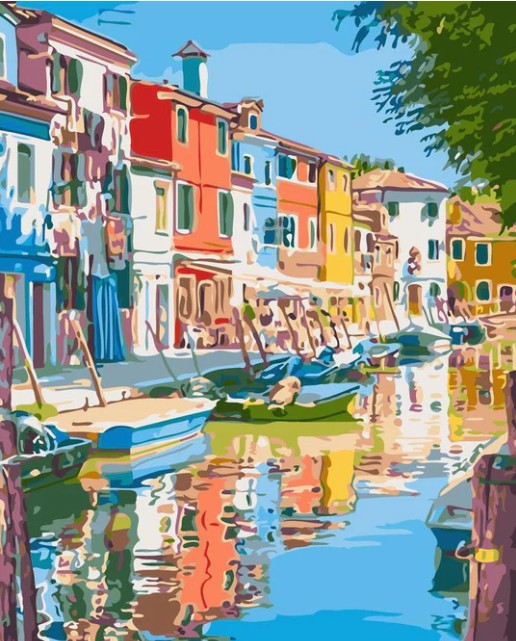 Colorful painted houses and boats along a calm canal with bright reflections