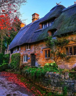 Stone Cottage with Thatched Roof