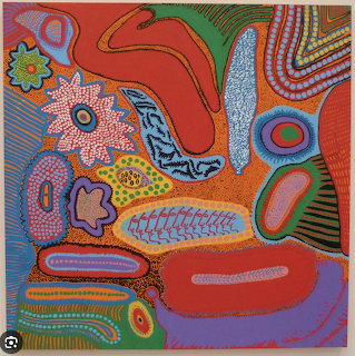 Abstract art with colorful geometric patterns, dots, and organic shapes on red and orange background
