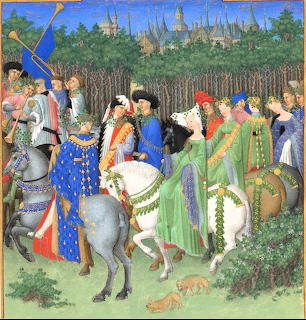 Medieval illuminated manuscript showing nobles in colorful robes on horses during a May Day cavalcade in a wooded landscape