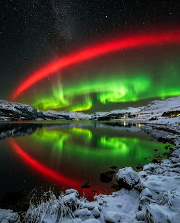 Northern Lights Over Snowy Lake