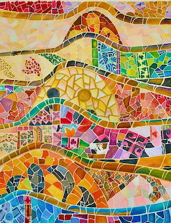 Colorful ceramic tile mosaic with wavy patterns in yellow, orange, pink, blue and green with embedded decorative pieces