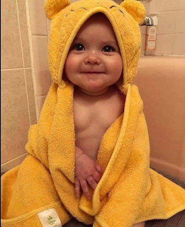 Baby in Yellow Hooded Towel