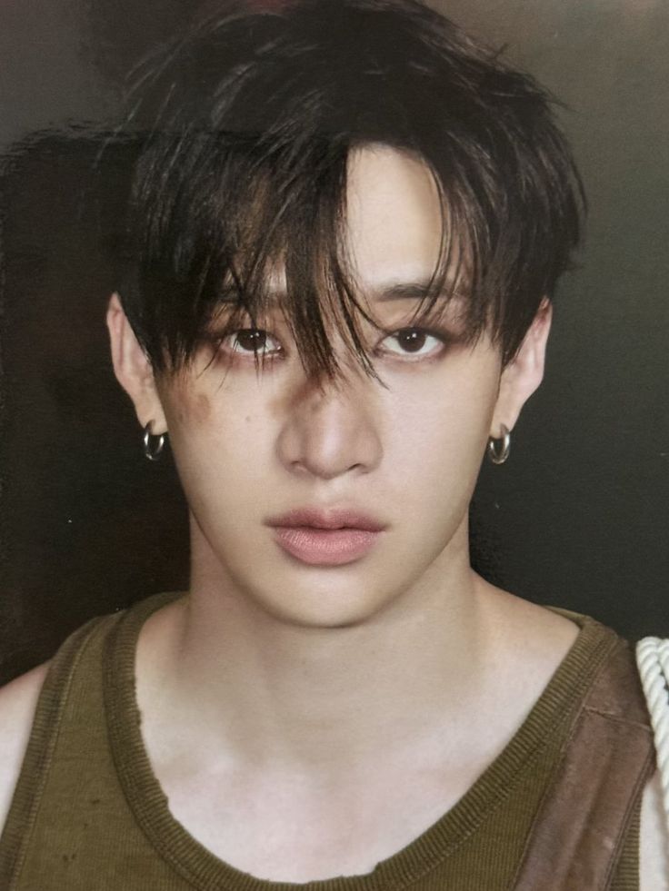 Bang Chan of Stray Kids posing for a portrait photo