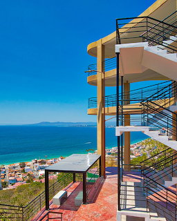 Modern architectural terrace with ocean view of Puerto Vallarta bay and beach