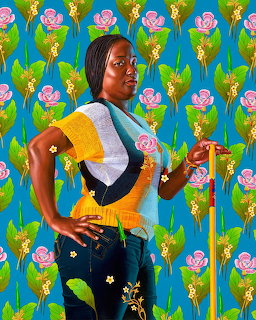 Painted portrait of a Black woman in colorful top posing against a bright blue floral patterned background