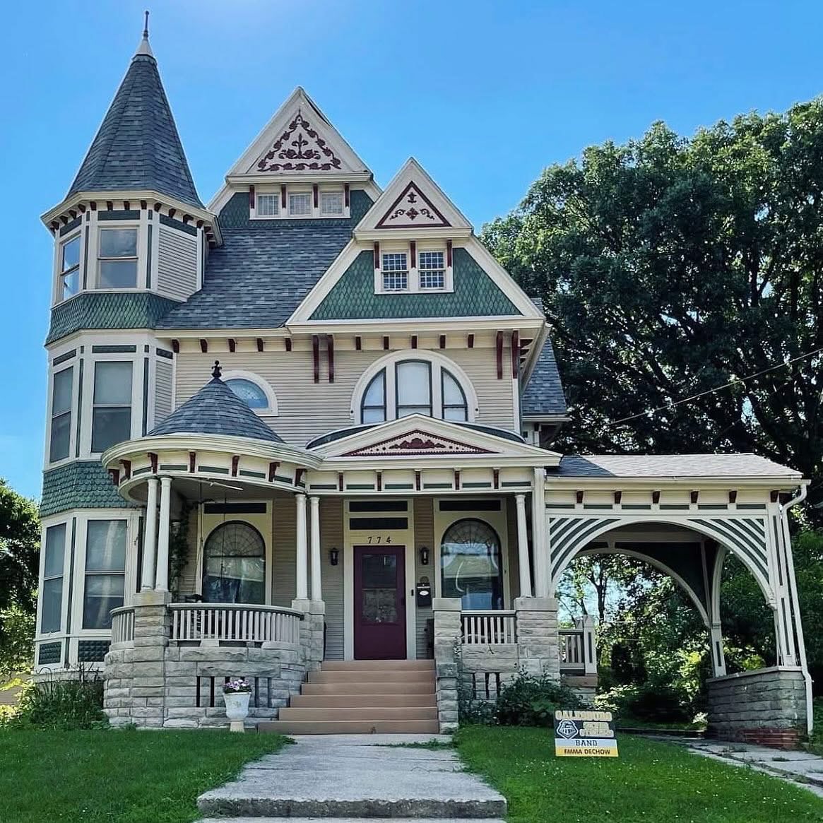 Victorian Queen Anne house with turret and ornate architectural details