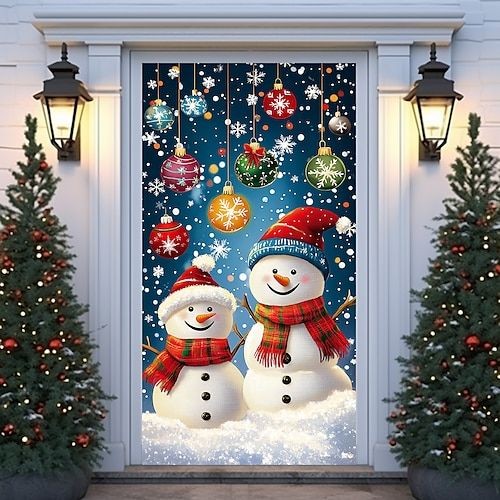Two smiling snowmen with red scarves and hats on decorated door with Christmas ornaments and trees