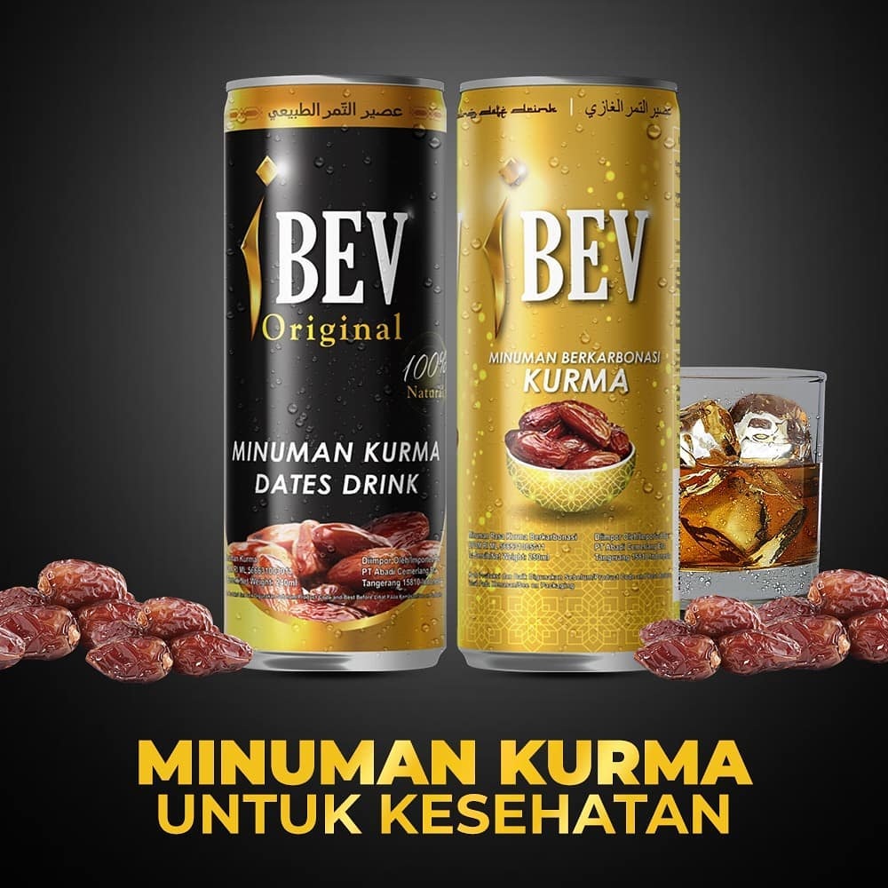Two cans of dates drink beside a glass with ice and dates on a dark background