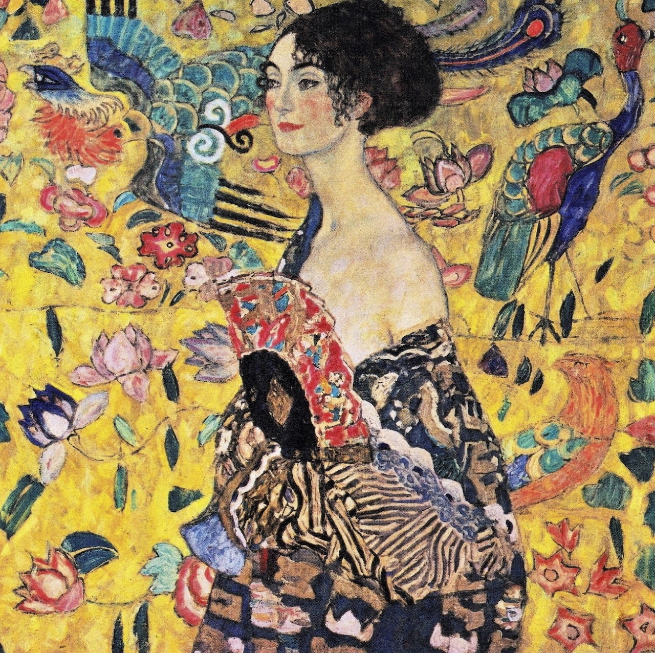 Gustav Klimt painting of a woman with a fan amid birds, flowers, and gold decorative patterns