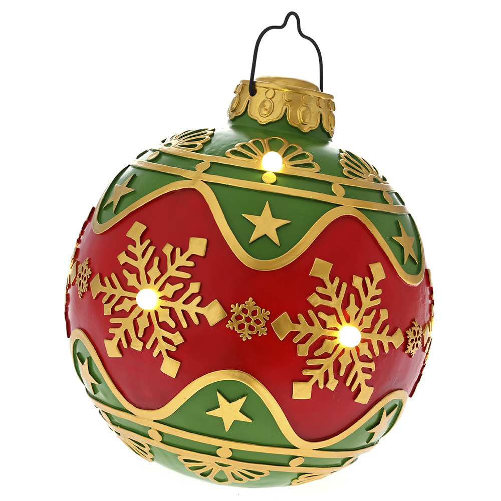 Red and green Christmas bauble with gold snowflakes and stars on a white background