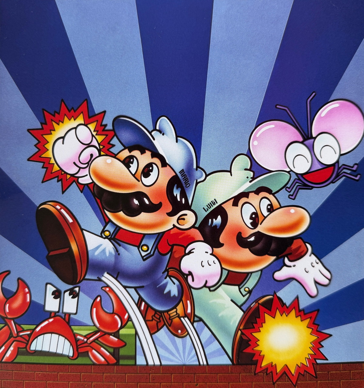 Retro Mario Bros arcade box art with Mario and Luigi fighting crabs and flies