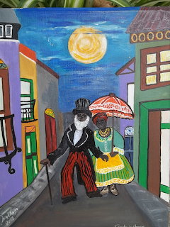Folk painting of a couple in traditional dress walking down a colorful street under a full moon