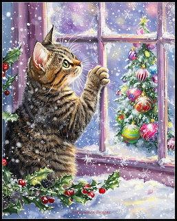 Taby cat reaching up to touch snowflakes on a window with a Christmas tree outside