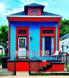 Vibrant Blue and Red Cottage