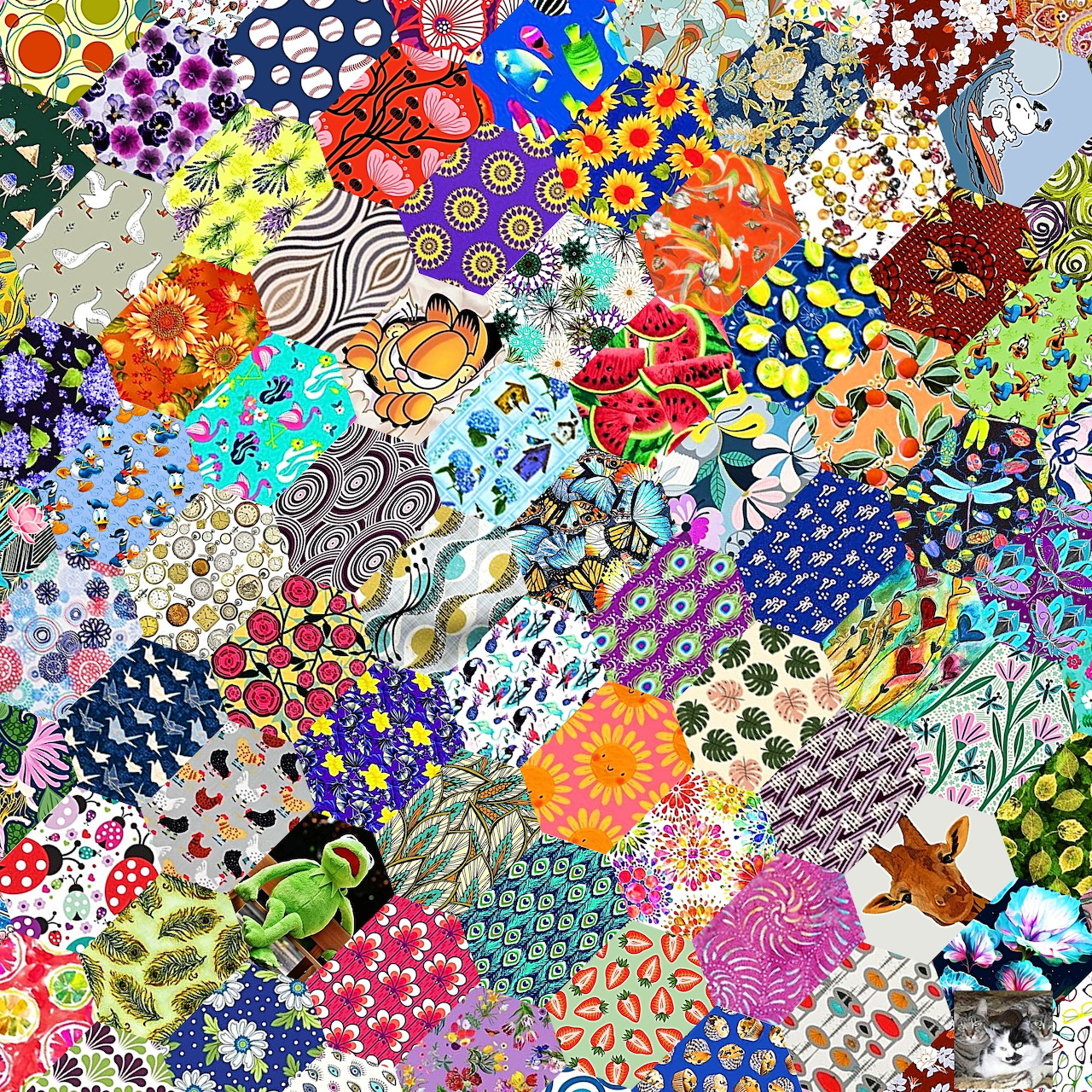 Vibrant patchwork quilt with mixed floral, geometric and abstract fabric patterns in many colors